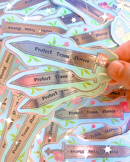 "Protect Trans Stories" Metallic 3" Sword Sticker